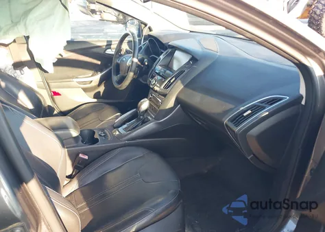 2012 Ford Focus Titanium z USA, uszkodzony, nr VIN 1FAHP3N20CL472573